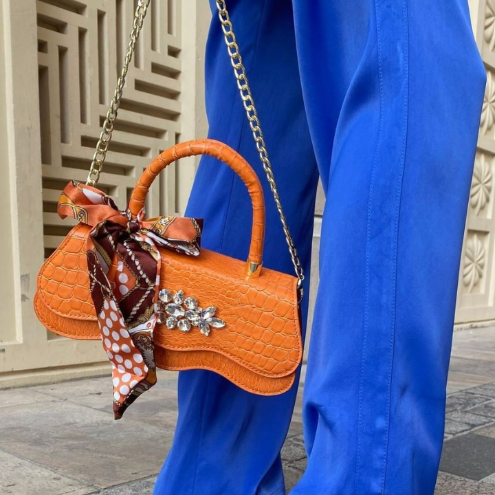 Orange cross over bag best sale